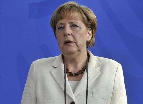 Меркель призвала украинские власти приступить к переговорам с членами ДНР и ЛНР