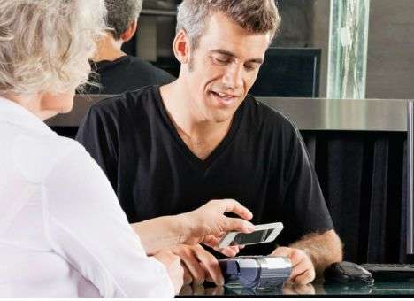 American Express разработает платежную систему для iPhone