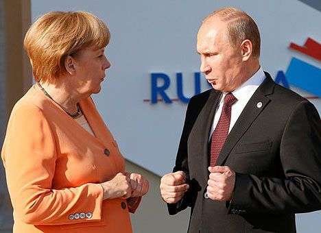 Путин и Меркель обсудили Донбасс и начали планировать встречу по Украине