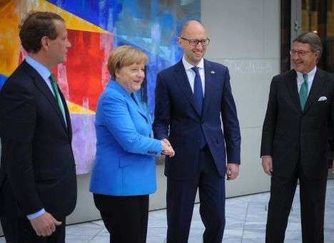 Говорить о выполнении Минских соглашений пока рано, - Меркель