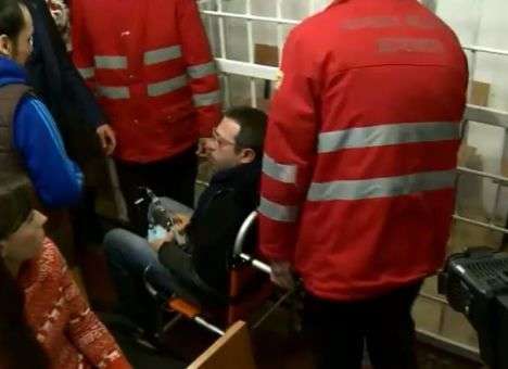 Корбана в машине «скорой» привезли в суд