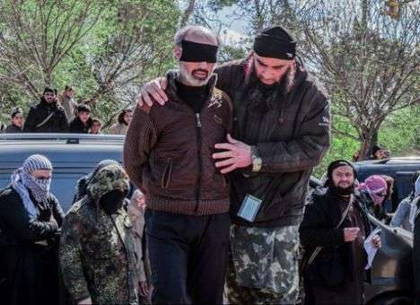 Террористы ИГИЛ выложили в Интернет кадры очередной ужасающей казни (ФОТО)