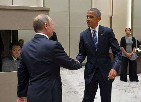 На встрече с Обамой Путин улыбался (ФОТО)