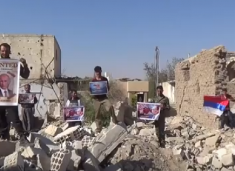 В Сирии протестующие сожгли флаг РФ (ВИДЕО)