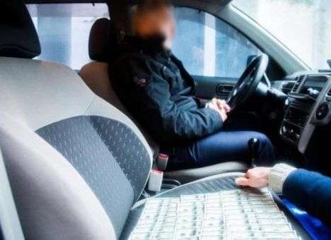 На взятке в 5 тысяч долларов поймали замначальника отдела Генпрокуратуры