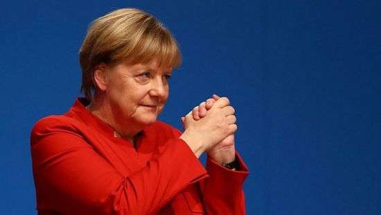 Порошенко и Гройсман поздравили Меркель с победой ее блока на выборах