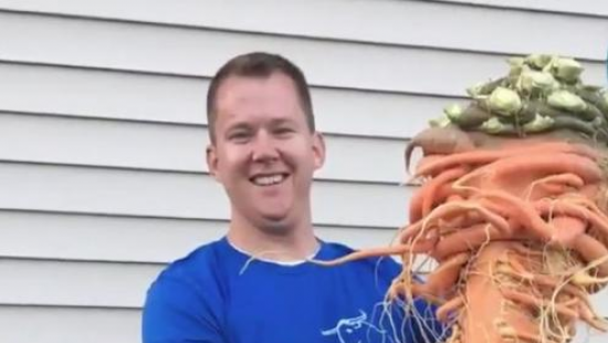 Американец попал в книгу рекордов Гинесса с гигантской морковью