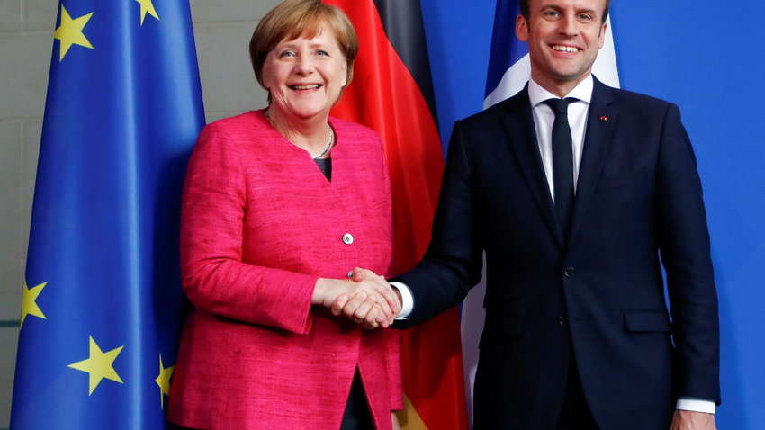 Меркель і Макрон підтримали розведення сил на Донбасі 