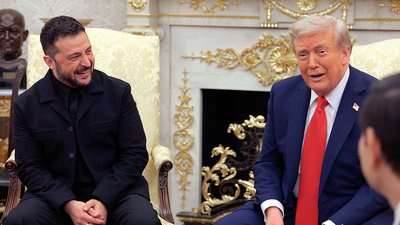 «У США плакатами закликали Зеленського вдягнути костюм»: що відомо