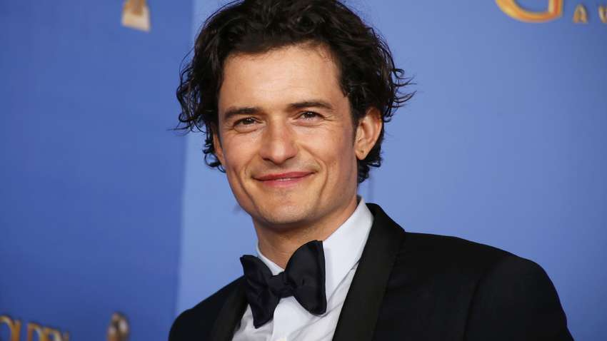 "Орландо Блума засмеяли поклонники": молодой папаша сделал татуировку с ошибкой в имени сына