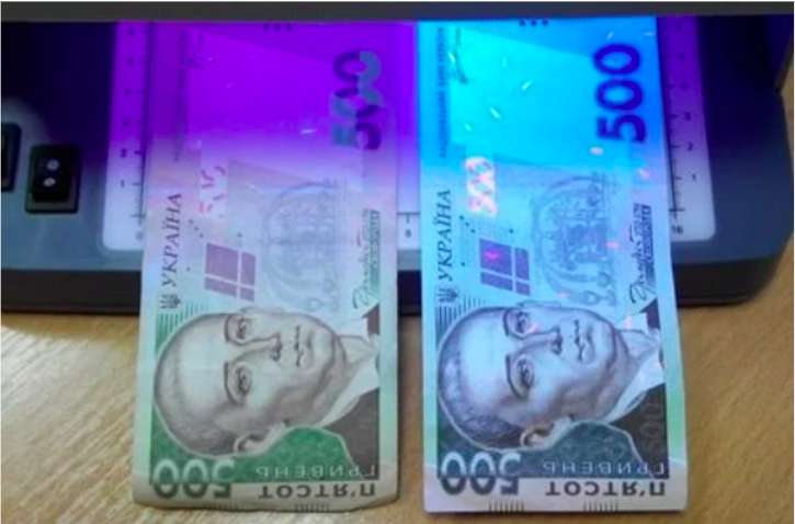 В Нацбанке рассказали как отличить фальшивые банкноты от настоящих В Нацбанке рассказали как отличить фальшивые банкноты от настоящих