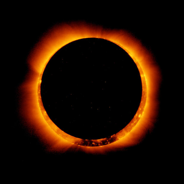 Огненное кольцо: опубликованы фото необычного солнечного затмения в самый длинный день года - фото 7