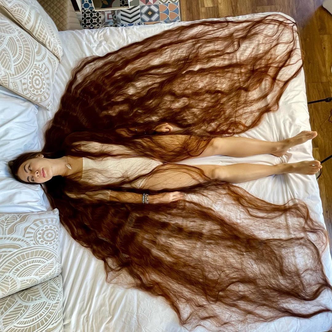 Самые длинные волосы в мире: украинка устанавливает новый мировой рекорд - фото 2