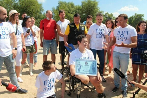 Подросток, который потерял на Донбассе обе ноги и руку, установил рекорд Украины (видео) - фото 2