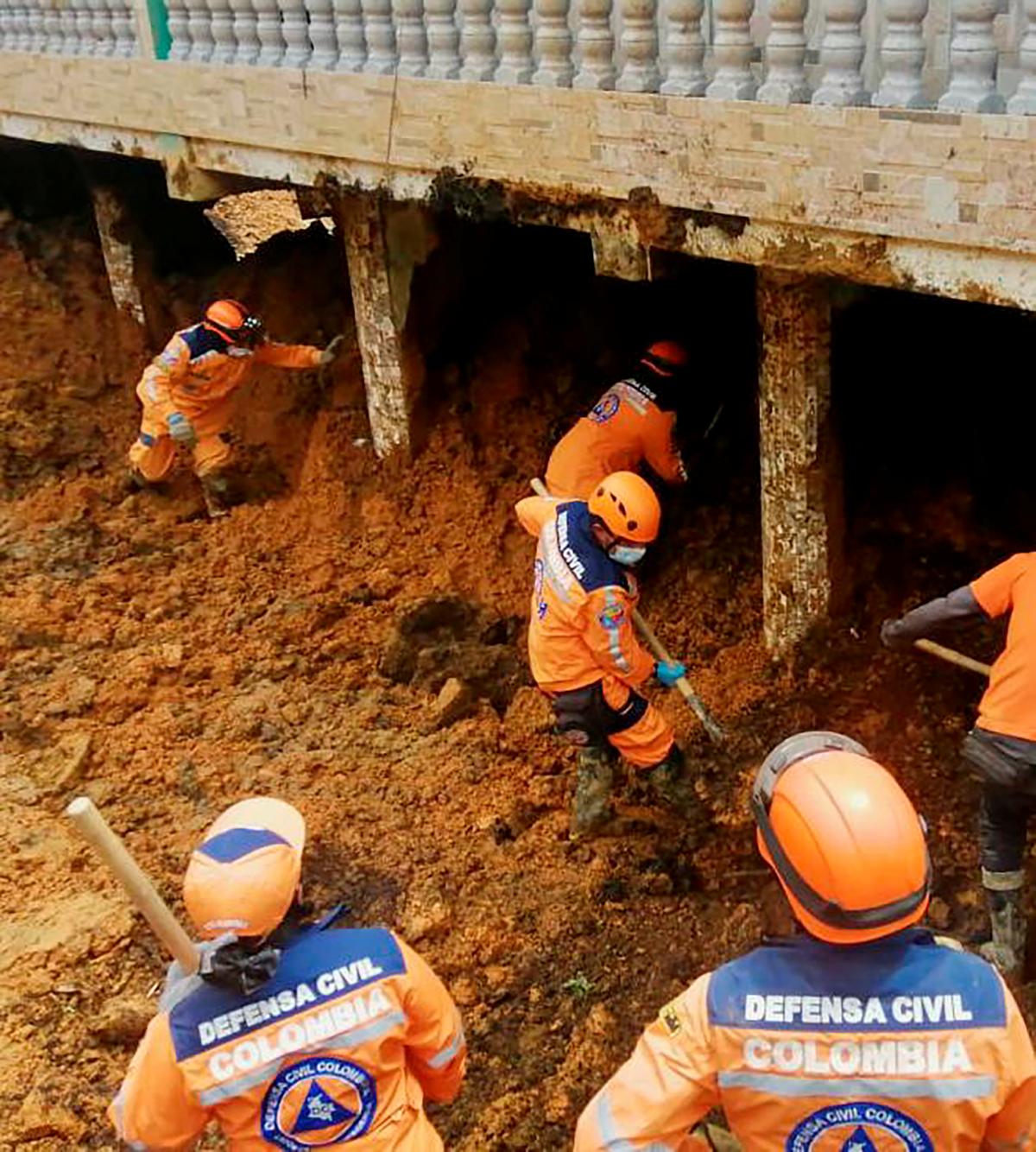 У Колумбії десятки людей виявилися похованими живцем через зсув (ФОТО) - фото 3